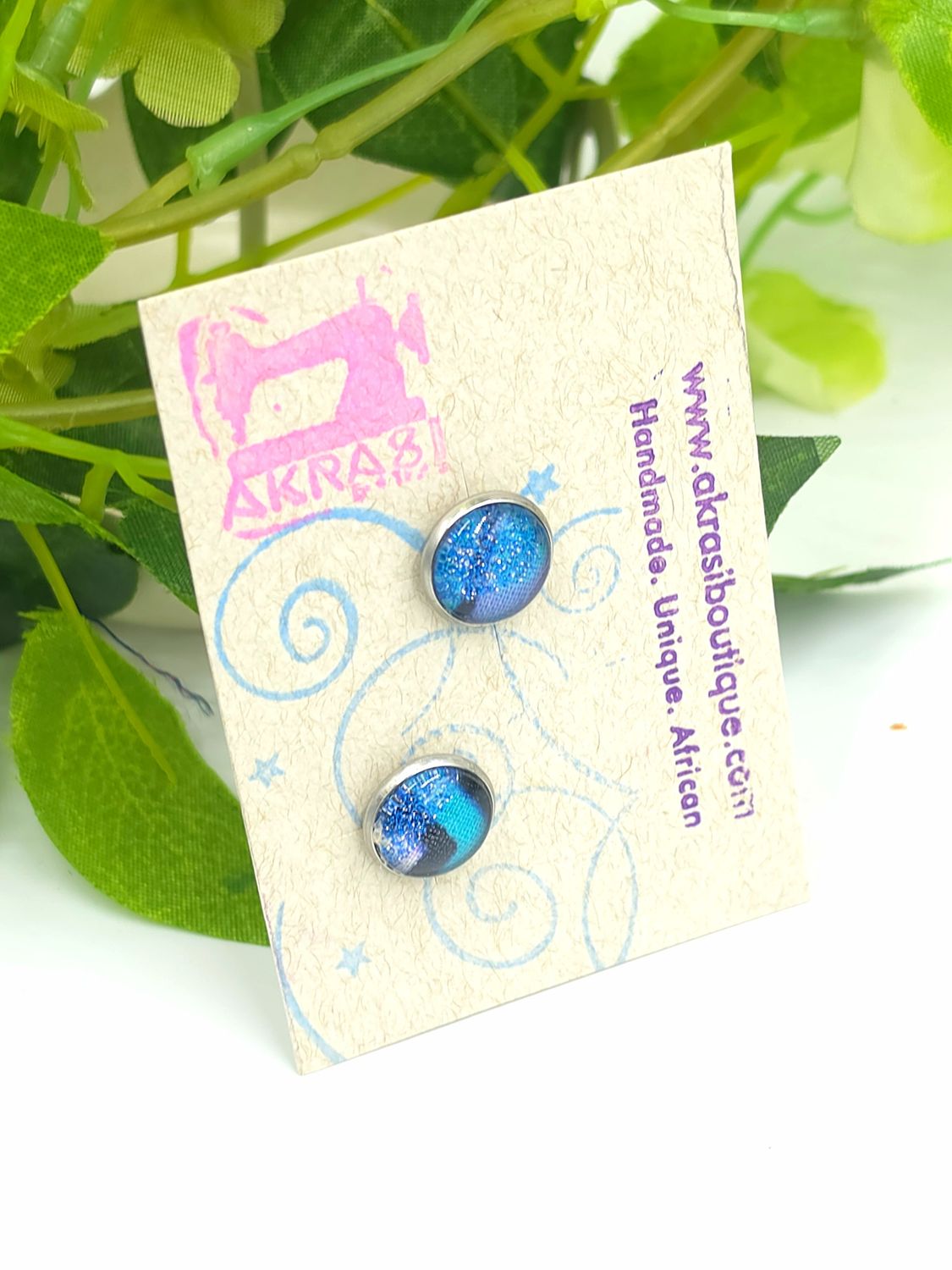 Round blue and glitter on silver stud earrings sealed in glass