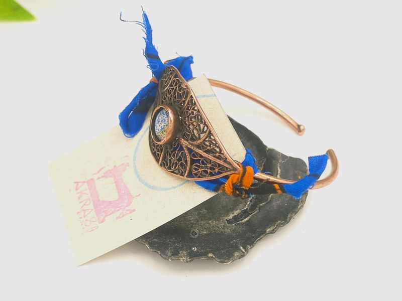 Wax print detail on copper bracelet