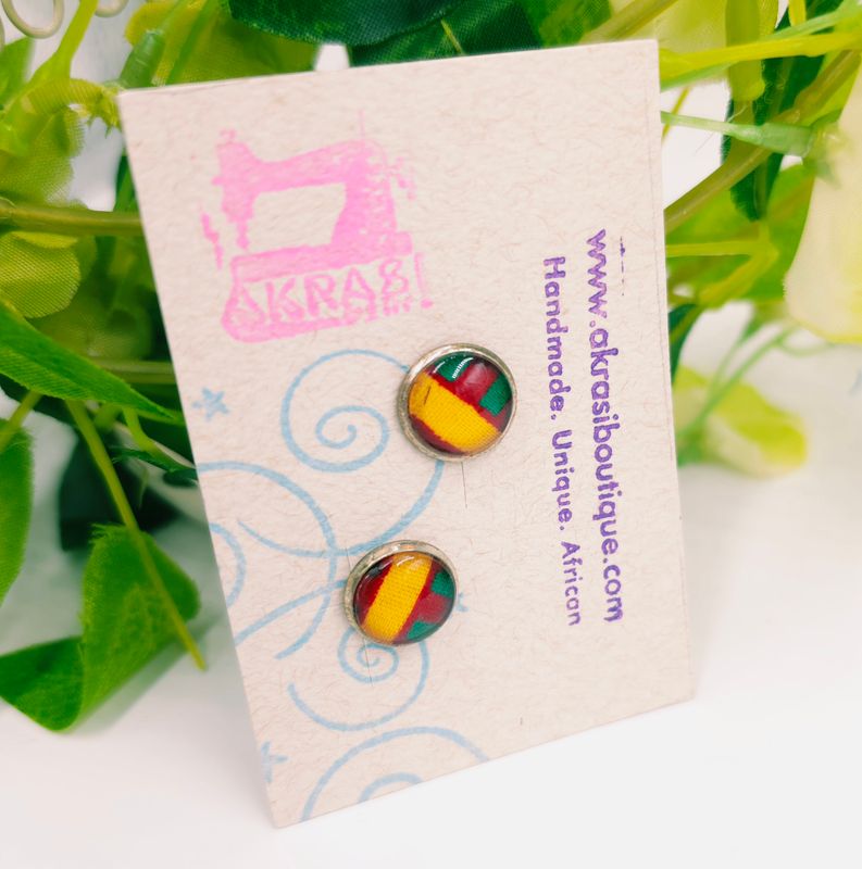 Round kente in yellow, red and green on silver stud earrings sealed in glass