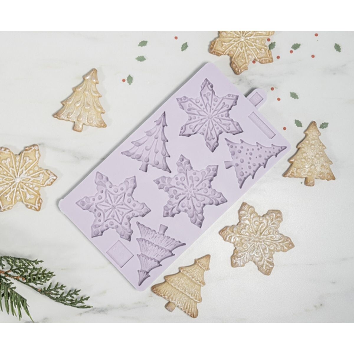 Drukvorm sneeuvlokken en kerstbomen