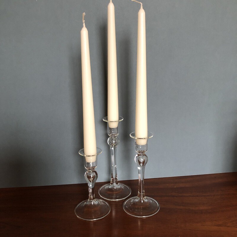 Set of three glass candlesticks