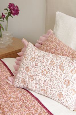 Coussin fleuri réversible