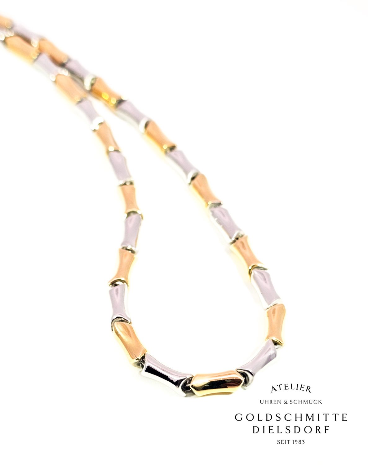 Collier in Fantasie Form bicolor Gelbgold / Weissgold 750 Collier in Fantasie Form bicolor Gelbgold / Weissgold 750