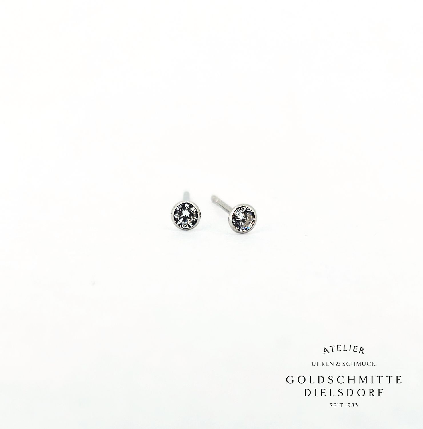Solitär - Ohrstecker mit 2 Zirkonia Weissgold 750