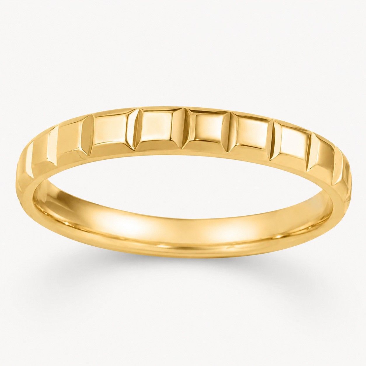 Trauring mit geometrischer Struktur in Gelbgold 750