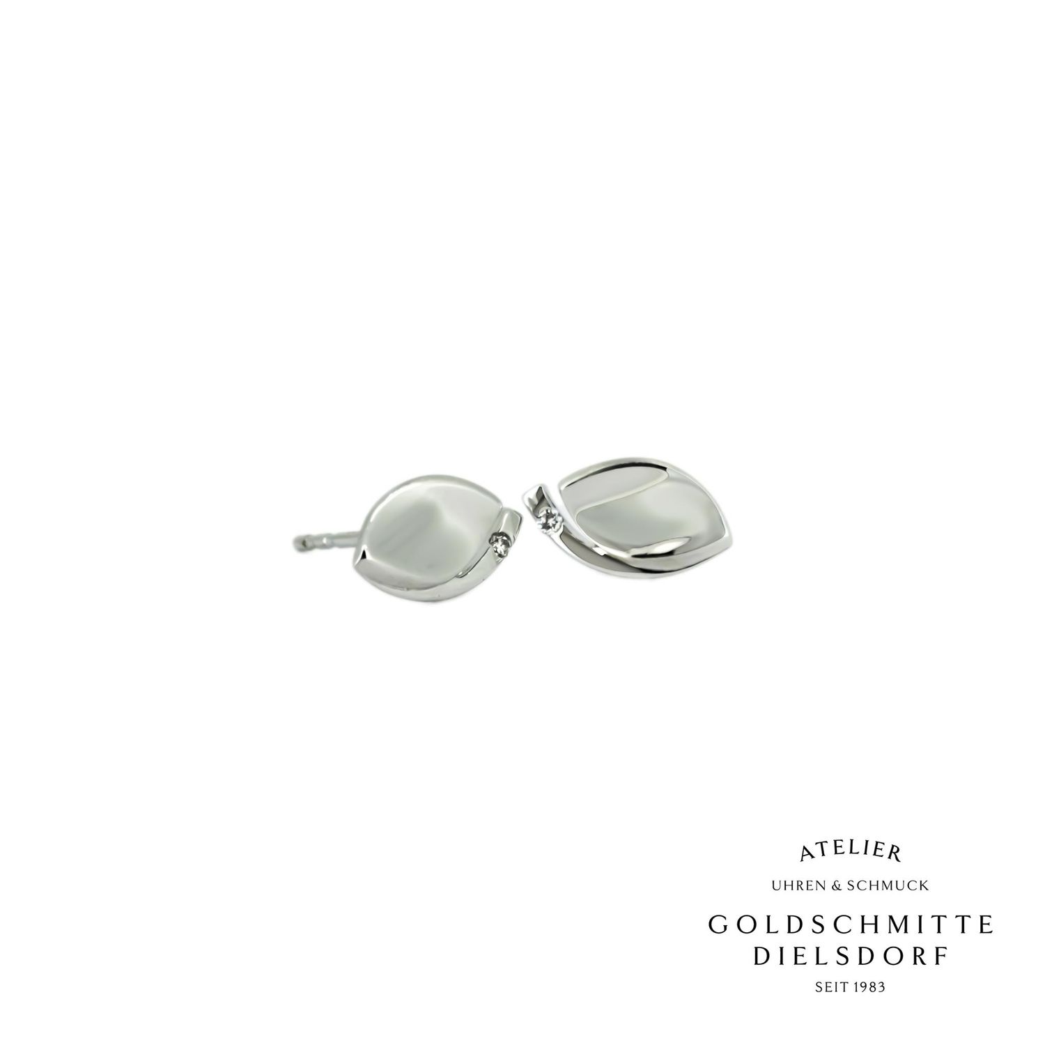 Ohrstecker in geschwungenem Design mit Brillanten Weissgold 750 Ohrstecker in geschwungenem Design mit Brillanten Weissgold 750