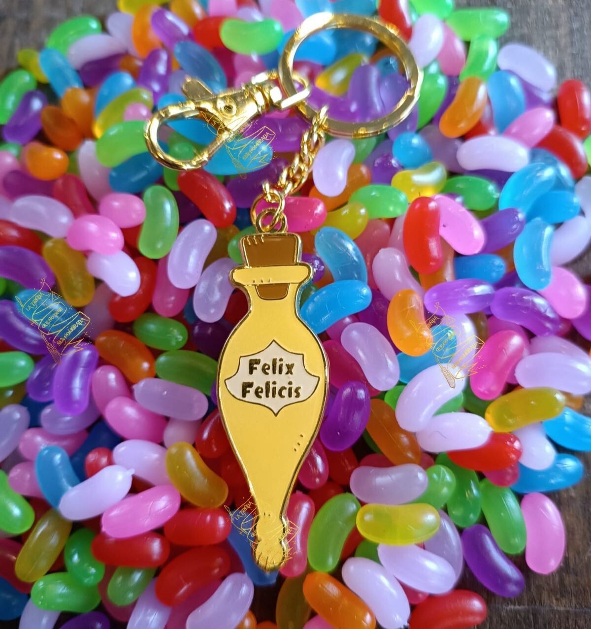 LLAVERO FELIX FELICIS ALUMBRA OSCURIDAD HARRY POTTER CARAT SHOP