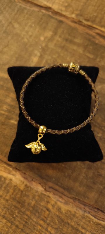 PULSERA SNITCH DORADA HARRY POTTER THE CARAT SHOP