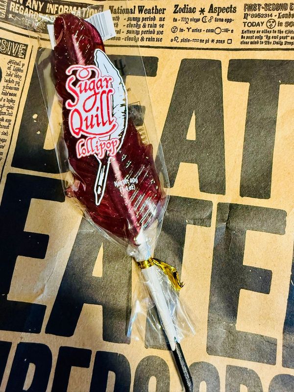 LOLLIPOP PLUMA GRANATE HARRY POTTER