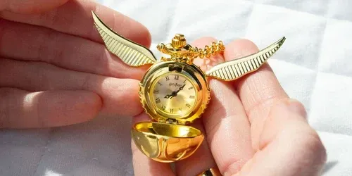 RELOJ COLGANTE SNITCH DORADA HARRY POTTER THE CARAT SHOP