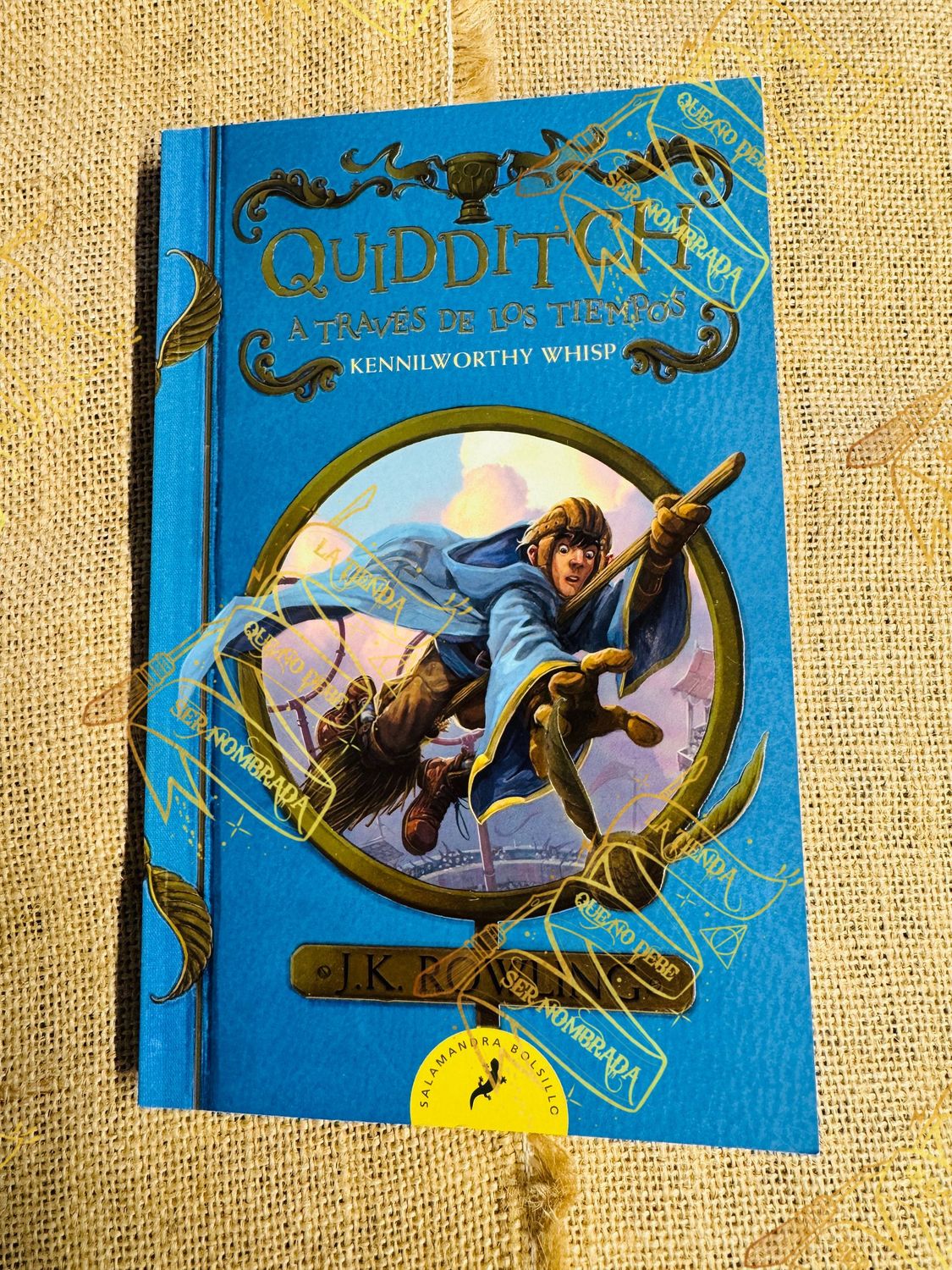 LIBRO QUIDDITCH A TRAVES DE LOS TIEMPOS FIRMADO POR OLIVER WOOD (SEAN BIGGERSTAFF)
