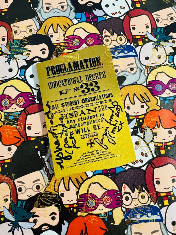 LINGOTE EJERCITO DUMBLEDORE FIRMADO POR PADMA PATIL (AFSHAN AZAD) & POR KATIE BELL (GEORGINA LEONIDAS)