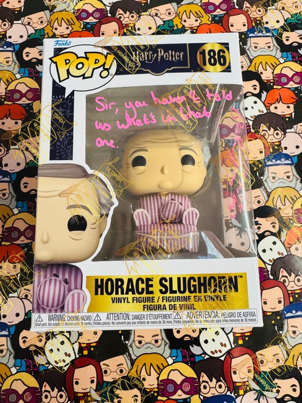 FUNKO POP DESCATALOGADO HORACE SLUGHORN FIRMADO POR KATIE BELL (GEORGINA LEONIDAS)