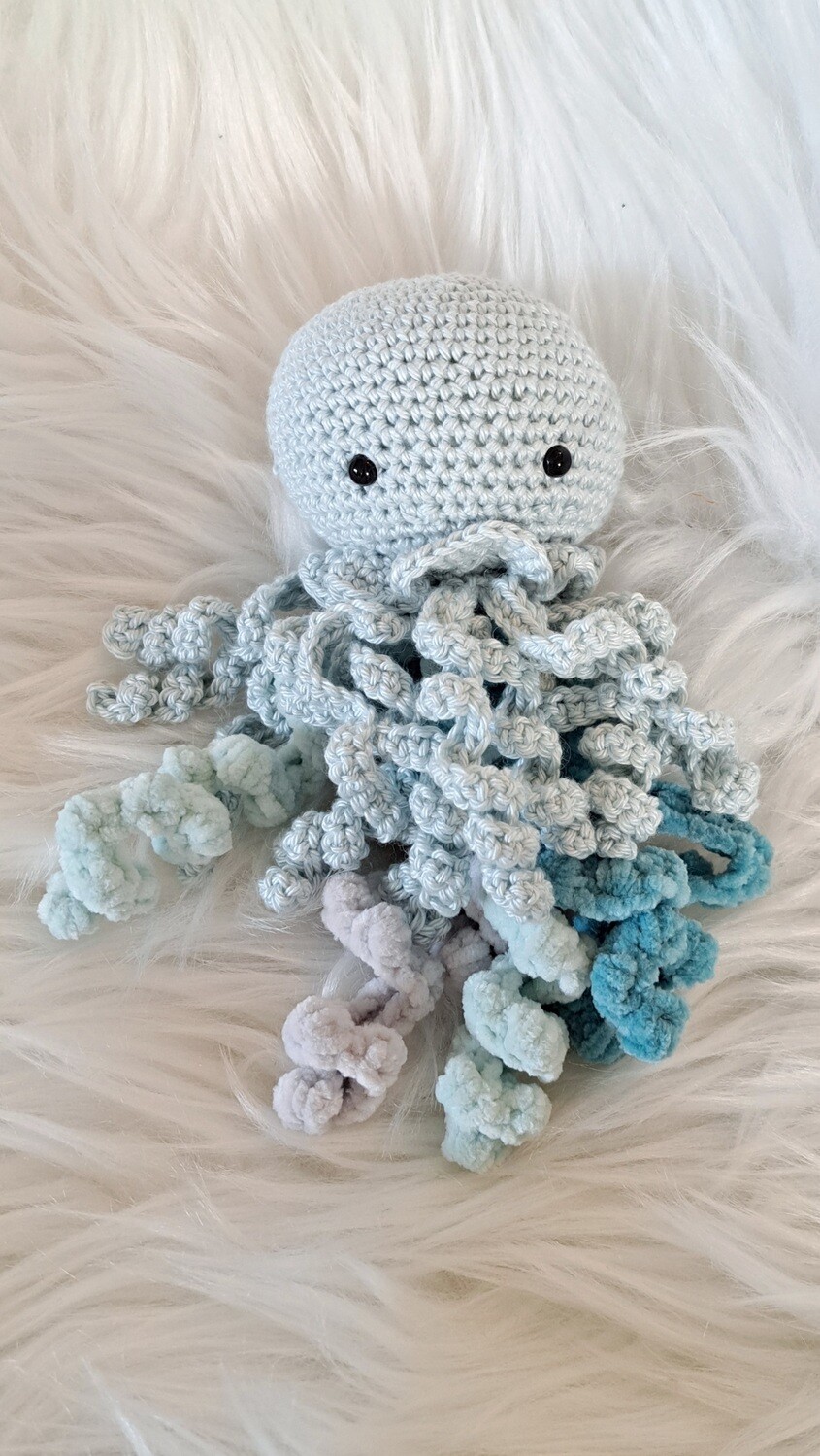 Doudou Méduse grelot bleu pastel avec tentacules