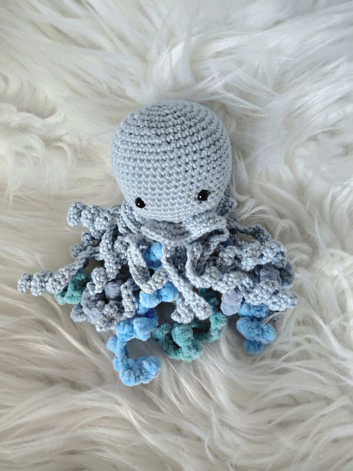 Poulpe grelot  bleu avec tentacules