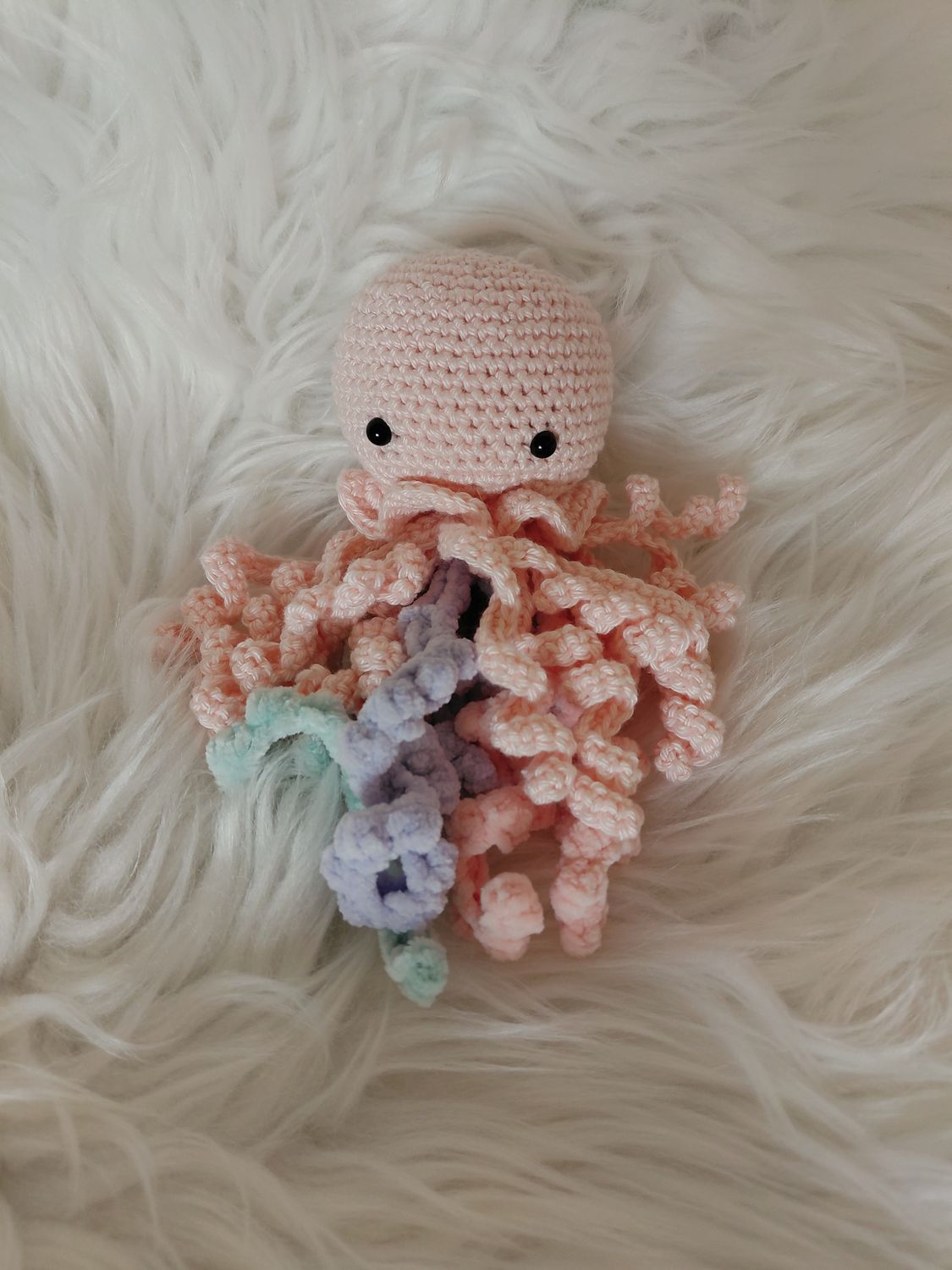 Poulpe grelot rose avec tentacules