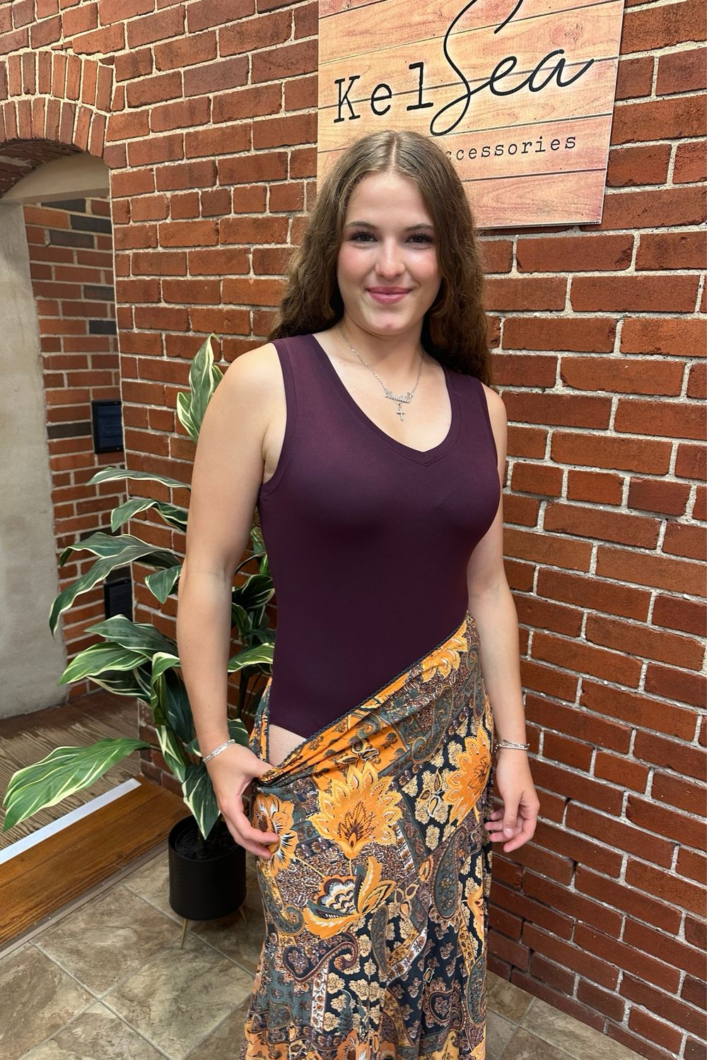 Deep Plum Butter Bodysuit