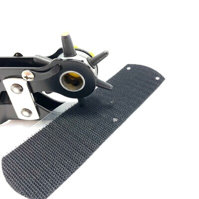 Punch 6 to 8 small holes in the Velcro strip