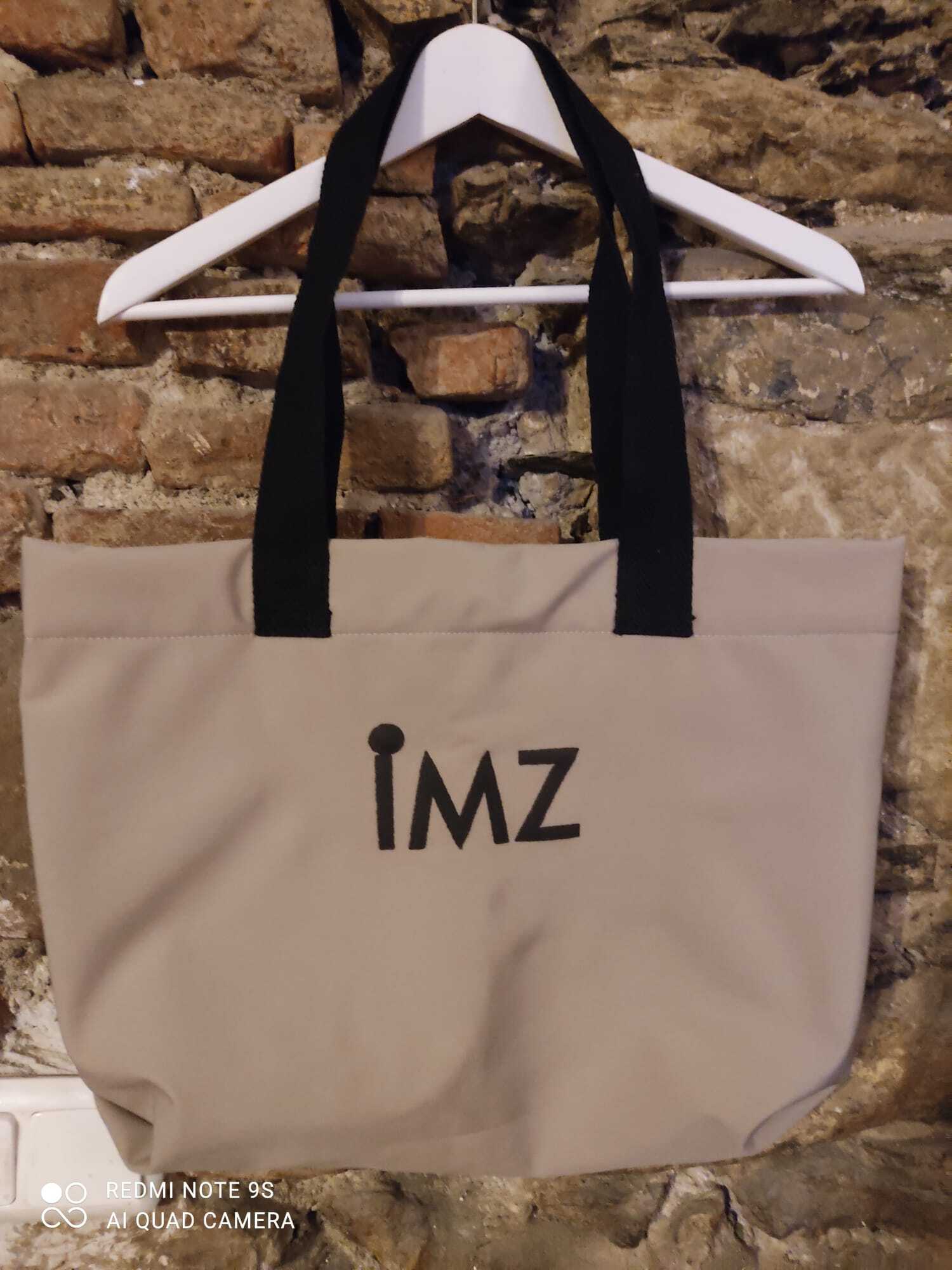 Bolso color arena.   antes 49€