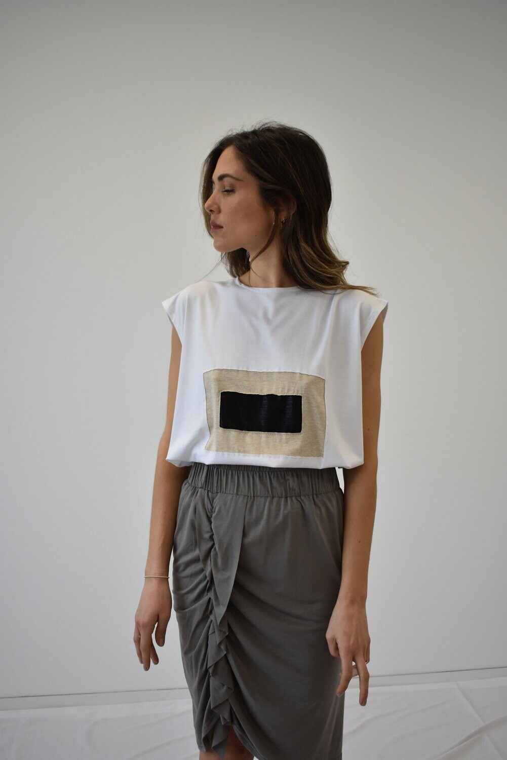 Camiseta sin mangas blanca ANTES 48€, AHORA 30€