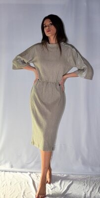V9 22. Vestido en punto beige. Antes 118€ AHORA 70€