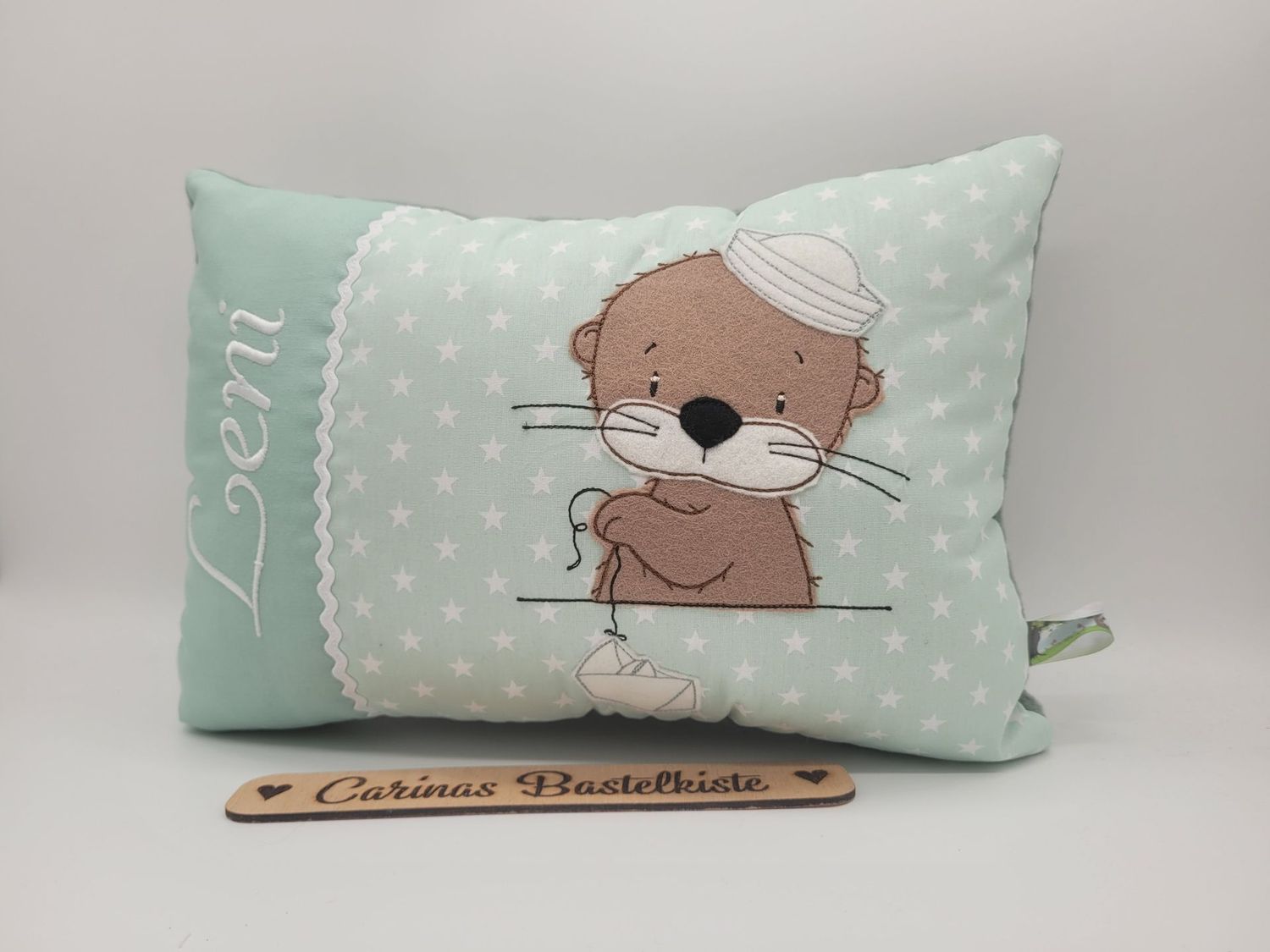 Kissen Otter mit Boot