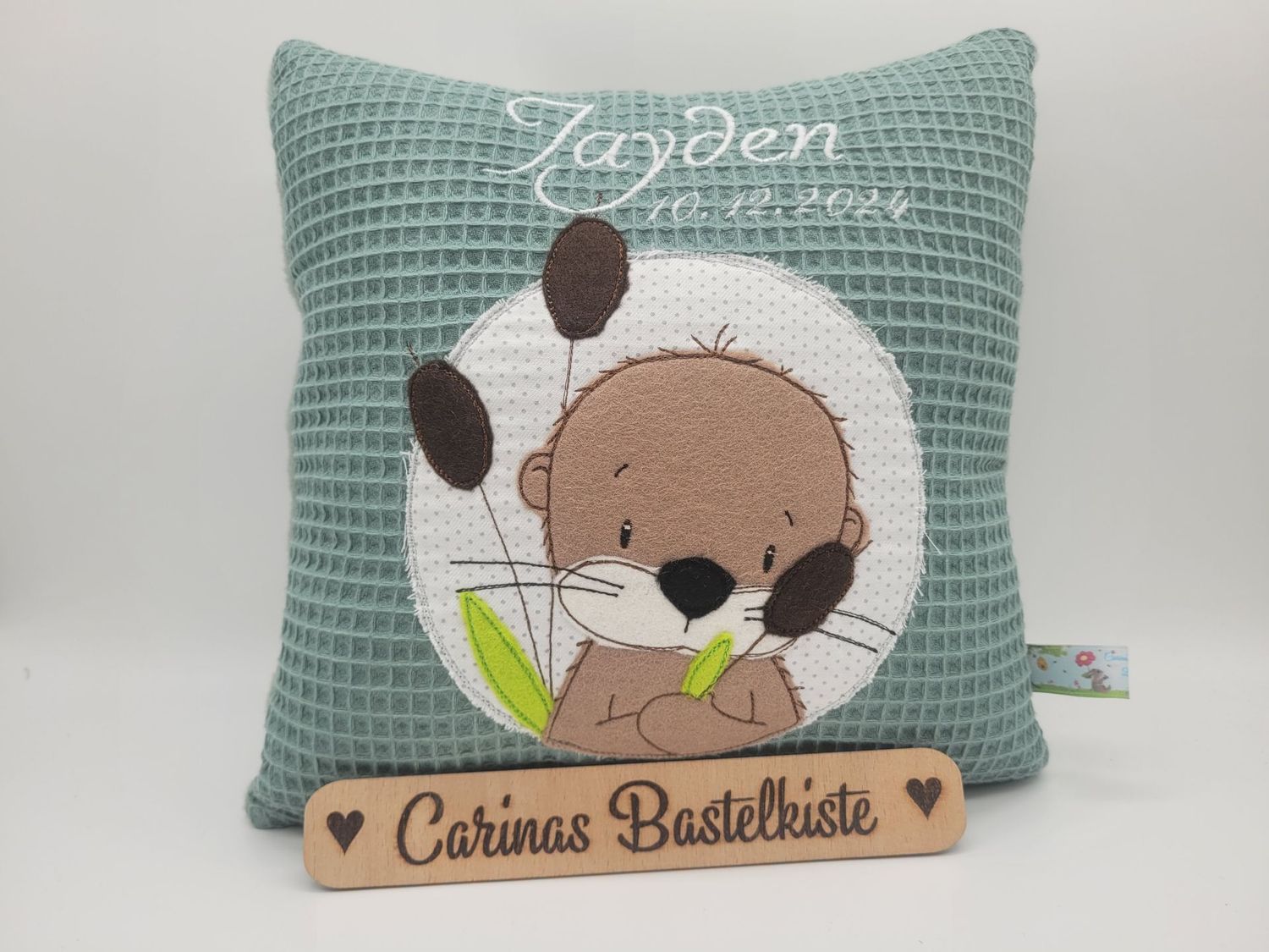 Kissen Otter mit Schilf