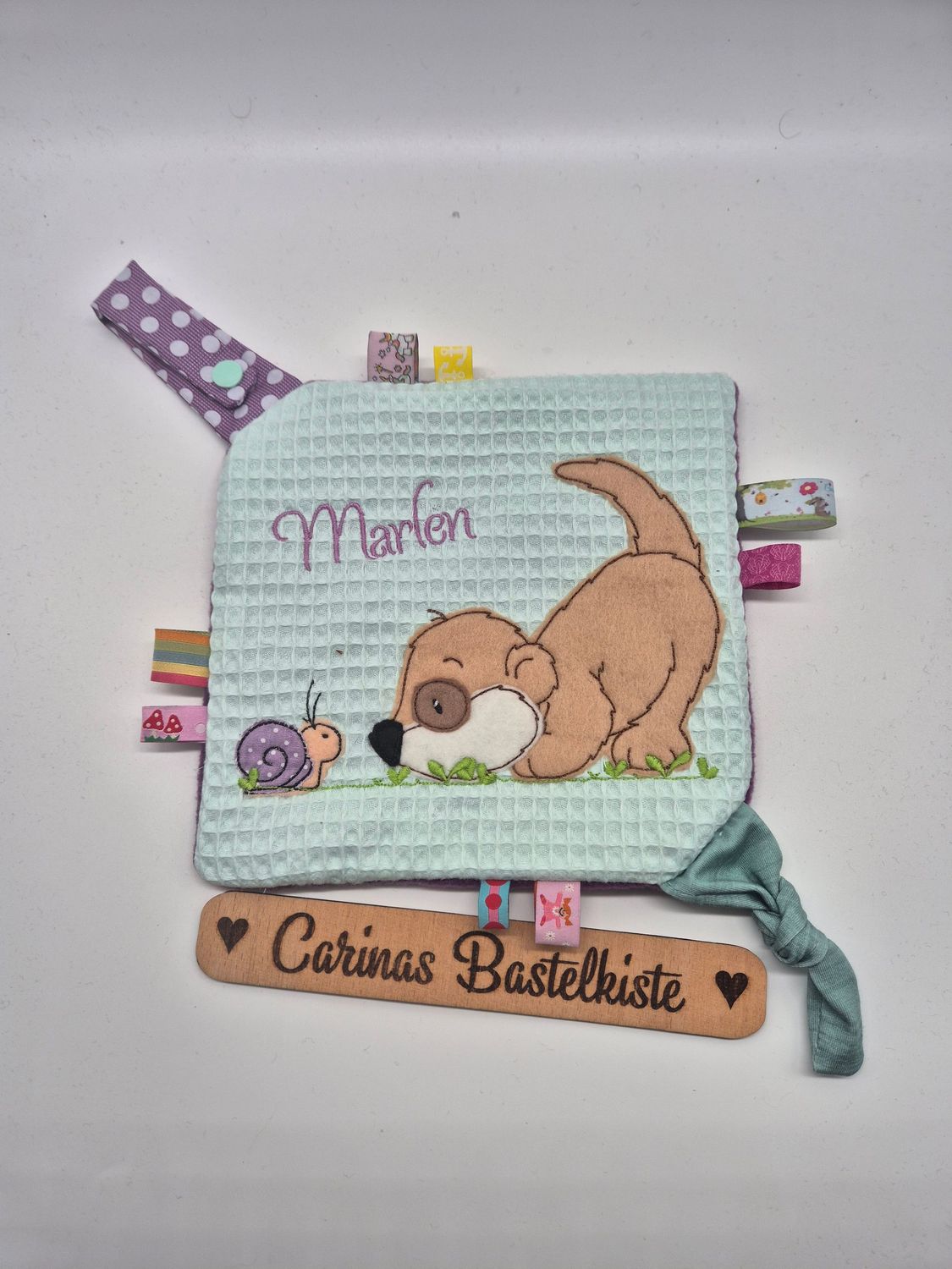 Knistertuch Erdmännchen mit Schnecke