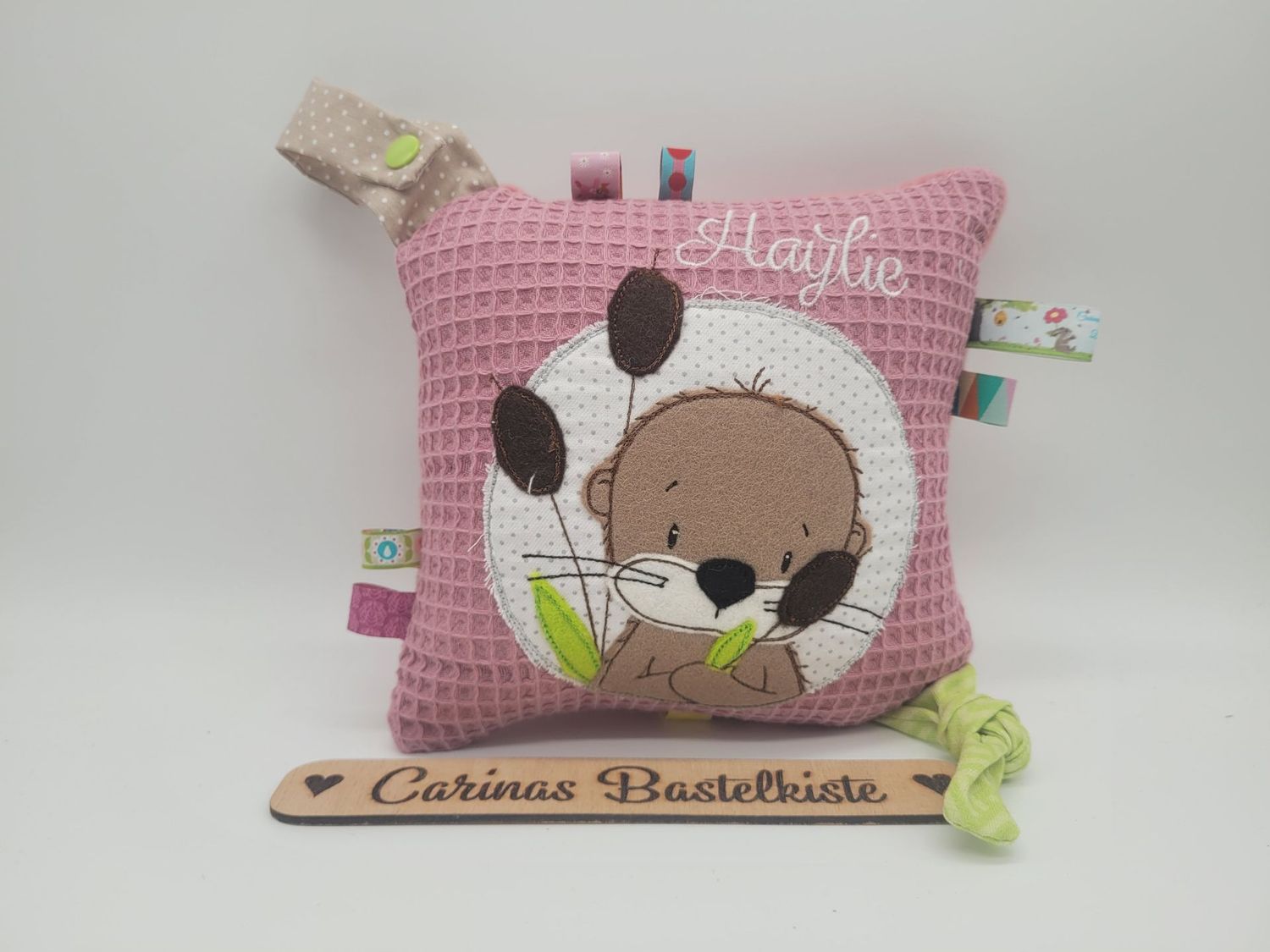 Schnullerkissen Otter