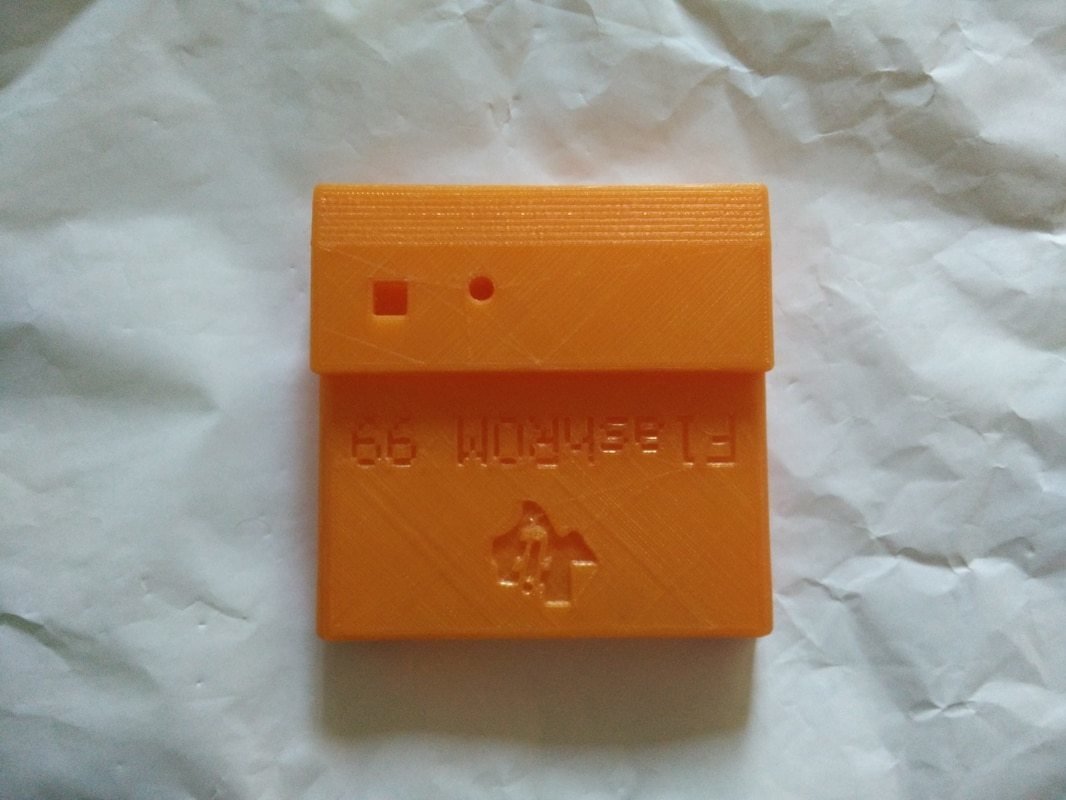 3d Printed case for FlashROM99 for flush button type with TI logo and title - Orange