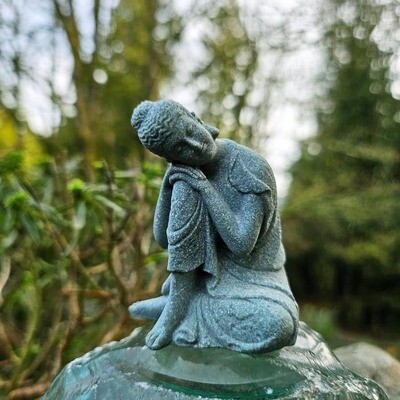 Sleeping Buddha figurine