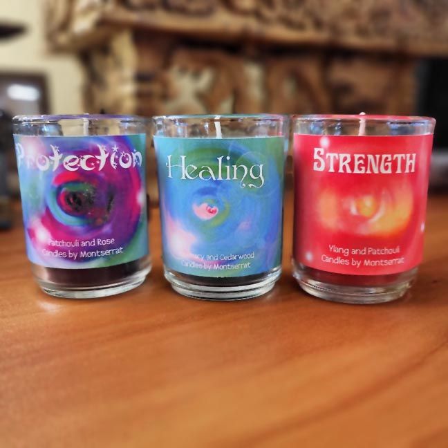 Organic soy glass jar candle with essential oils and a hidden gemstone or charm inside.
