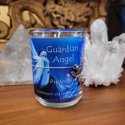 Guardian Angel organic soy candle with Frankincense, Sandalwood, and angel charm for peace and protection.