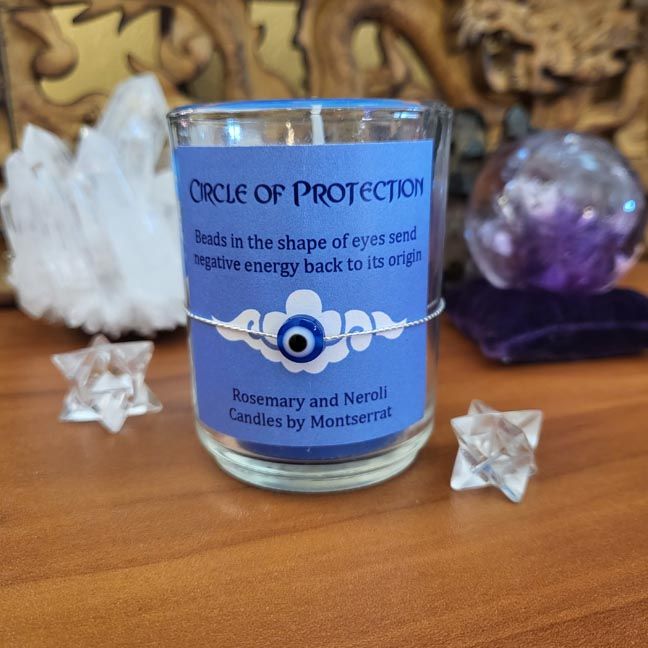 Circle of Protection organic soy candle with Rosemary, Neroli, and Third Eye bead for clarity and spiritual safety.