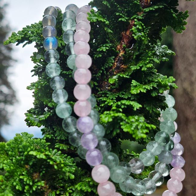 108‑bead mala with 6mm Green Fluorite, Black Moonstone, Rose Quartz, and Lilac Amethyst, finished with a star charm