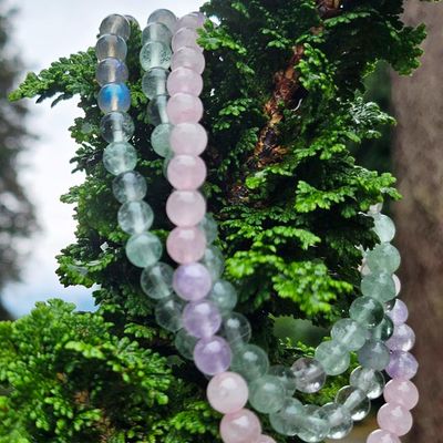 108‑bead mala with 6mm Green Fluorite, Black Moonstone, Rose Quartz, and Lilac Amethyst, finished with a star charm