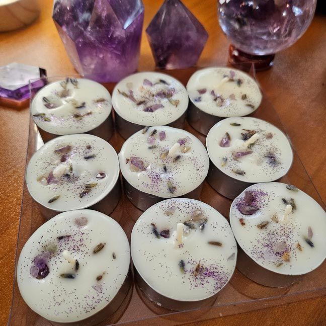 Lavender soy tea lights with amethyst chips and organic lavender flowers in a gift box.