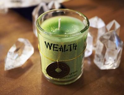 Wealth organic soy candle with Lemon, Lemongrass, and Feng Shui coin for abundance and prosperity.