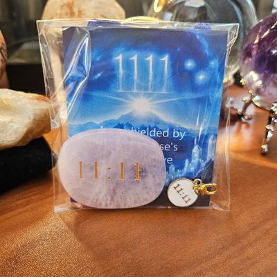 11:11 Rose Quartz blessing set with engraved palm stone, charm, pouch, and affirmation card for alignment and protection.