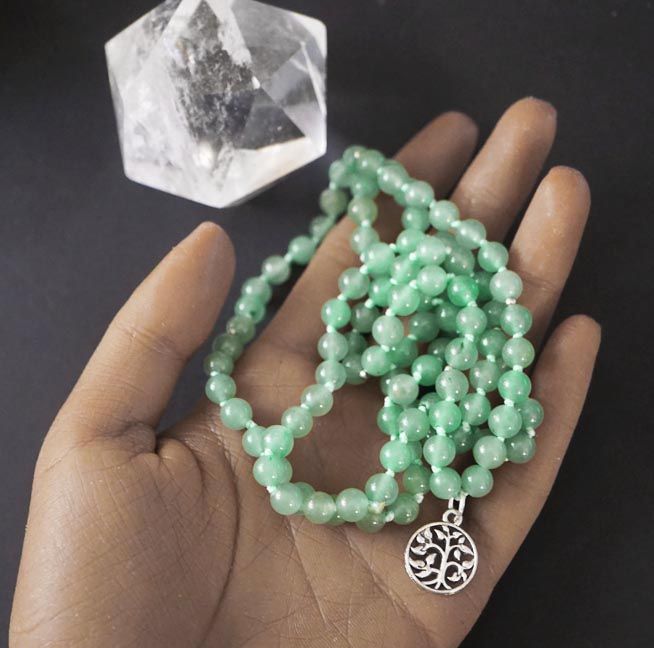 Green Aventurine 108‑bead mala with Tree of Life charm, symbolizing renewal and abundance.