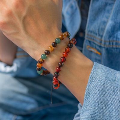 Multi‑color Agate bracelet duo with 8mm beads, featuring elastic and adjustable styles for grounding and harmony.