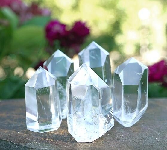Polished 1.5" Clear Quartz point for clarity, amplification, and healing energy.