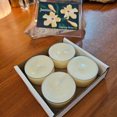 Jasmine soy white tea lights with a soft floral dusk fragrance in a box of four.