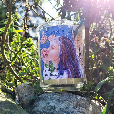 Angel’s Light organic soy candle with Frankincense and Sandalwood for peace, sweetness, and divine comfort.