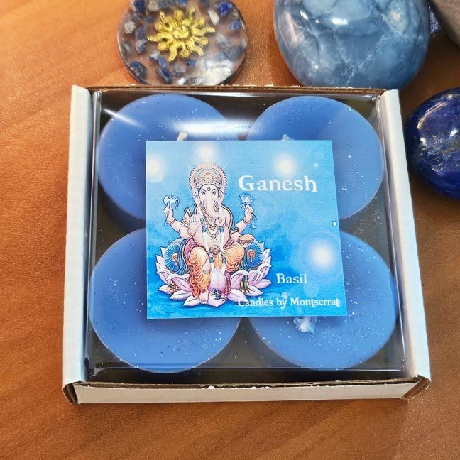 Ganesh soy tea lights with basil essential oil in a box of four.