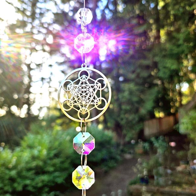 Metatron’s Cube suncatcher with crystal prisms for protection, clarity, and sacred geometry light.