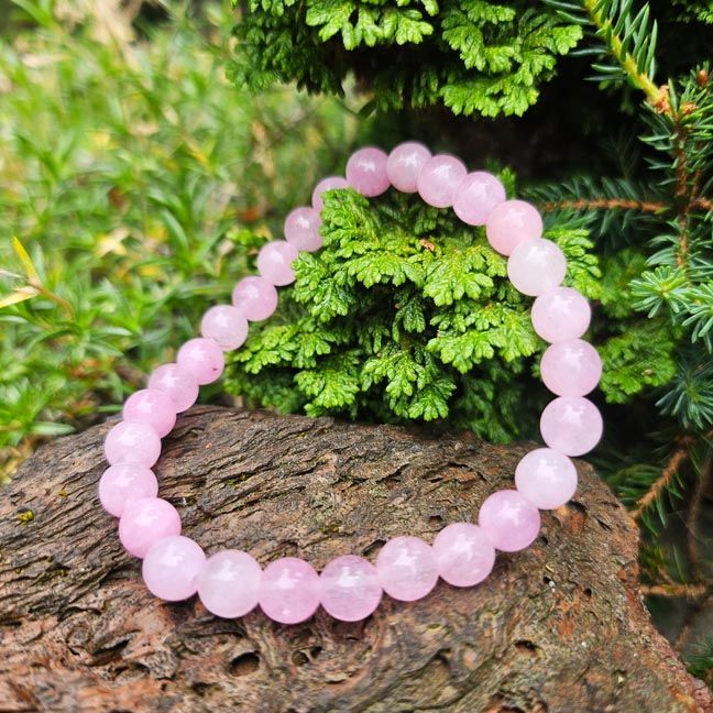 Pink Kunzite bracelet with natural 6mm beads offering heart healing, emotional clarity, and gentle feminine energy.