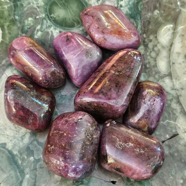 Large 1" tumbled Ruby stone with deep natural glow for courage, devotion, and lifeforce energy.
