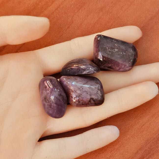 Large 1" tumbled Ruby stone with deep natural glow for courage, devotion, and lifeforce energy.