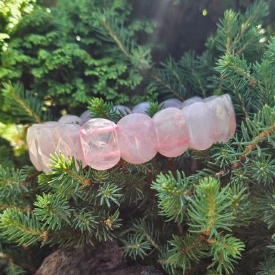 Rose quartz bracelet with flat faceted pink slabs, offering soothing heart‑centered energy and emotional healing.